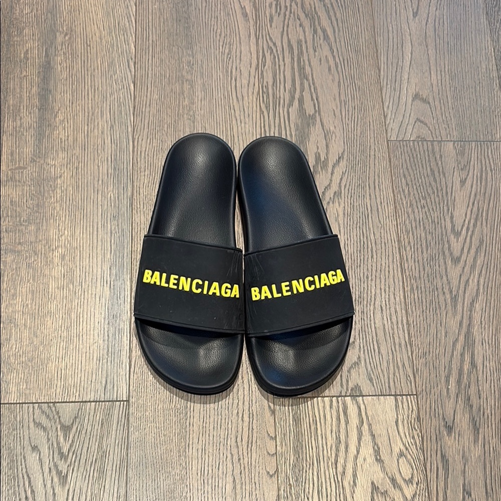 Balenciaga Black Slides with Vibrant Yellow Branding